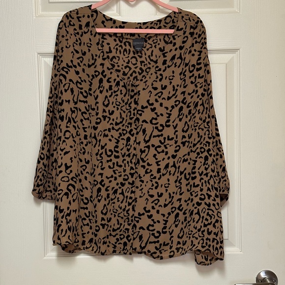 Covington Woman Tops - This is a Covington Woman animal print blouse. Size 2X.